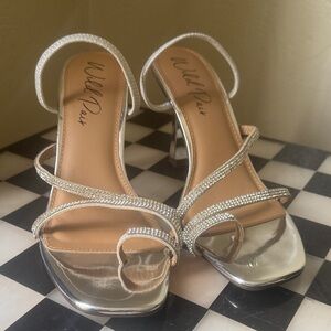 Wild Pair Shimmering Silver Strappy Heels